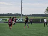 Laatste training S.K.N.W.K. JO11-1JM (partijtje tegen de ouders) van maandag 27 mei 2024 (18/137)